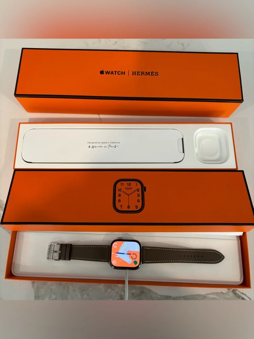 Hermes Smartwatch with Brown Leather Strap and Silver Case
